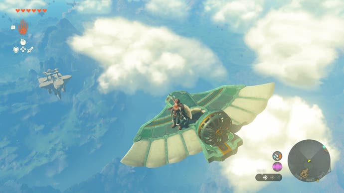 Link flying a Zonai fan-powered glider towards a sky island in The Legend of Zelda: Tears of the Kingdom.
