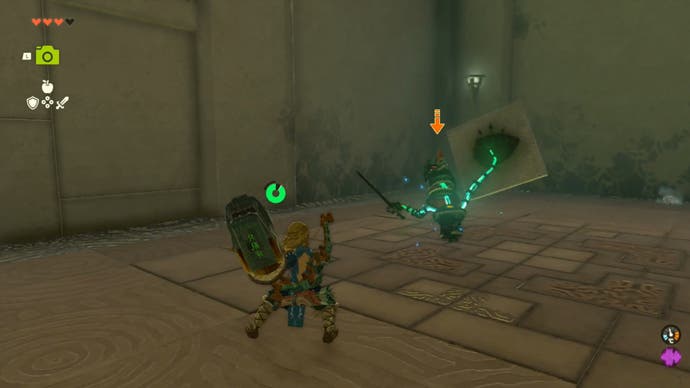 Zelda Tears of the Kingdom, Link is attacking a Zonai Soldier Construct holding a Stone Slab Shield in the Ijo-o Shrine.