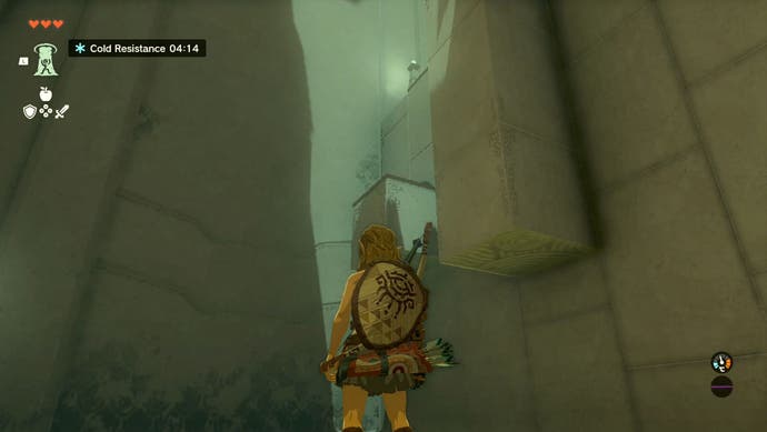 Link standing next to a tall wall in the Gutanbac Shrine location in The Legend of Zelda: Tears of the Kingdom.