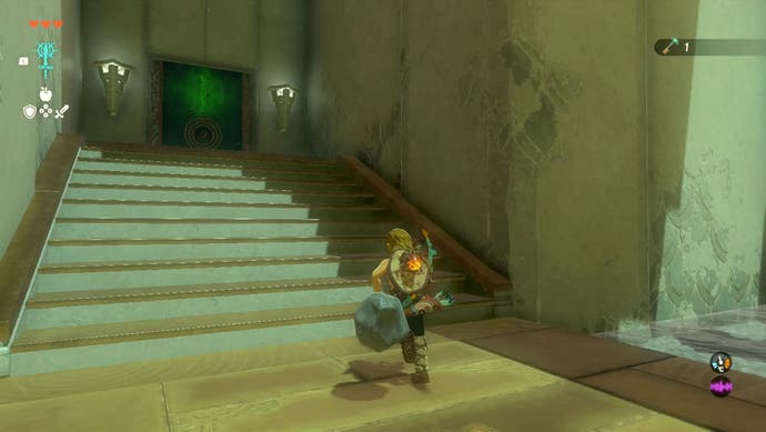 Link approaching a door in the In-Isa Shrine in The Legend of Zelda: Tears of the Kingdom.
