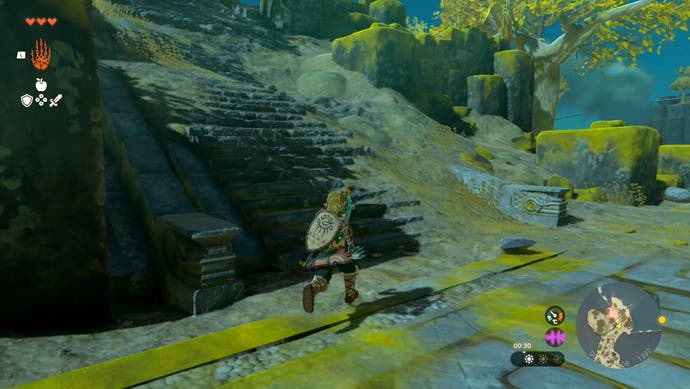 Link near a set of stairs that leads towards the In-Isa Shrine in The Legend of Zelda: Tears of the Kingdom.